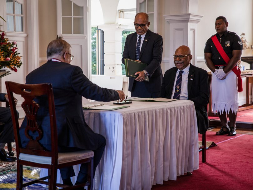 Anthony Albanese and Fiji’s Prime Minister Sitiveni Rabuka attend a welcome ceremony in Suva.