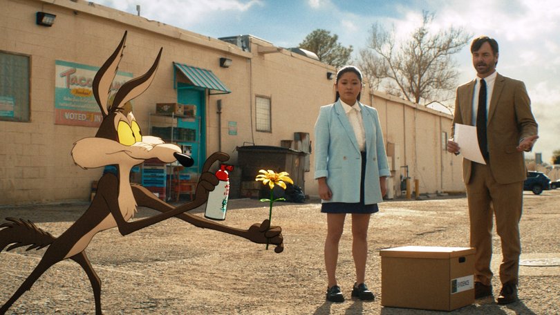Wile E Coyote consults with legal team Lana Condor and Will Forte.