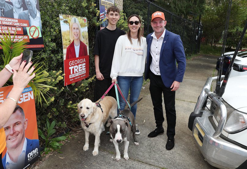 Voter Rebecca Green with her son and One Nation candidate Luke Herdegen.