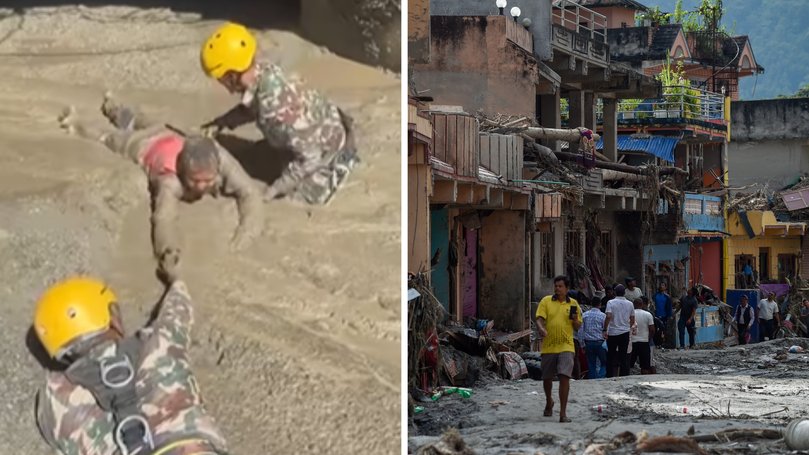 The number of missing Australians has climbed to 41 as dramatic vision captured the moment workers were freed from a tunnel in the flood disaster zone.
