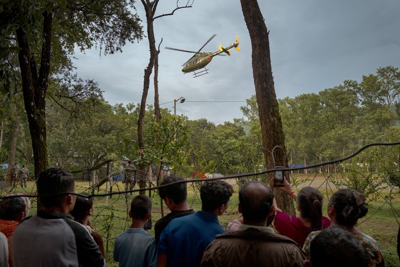 TA rescue helicopter takes off from a military camp, following flash floods on August 28, 2026 in Trishuli, Nepal.