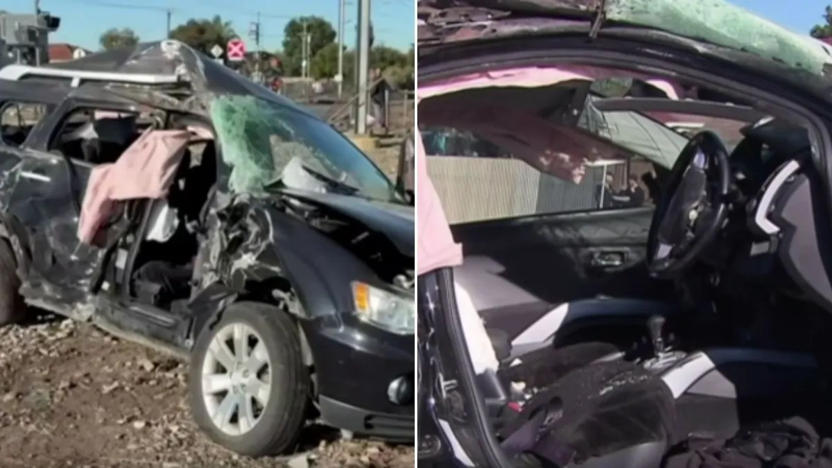 Young man lucky to escape with broken arm after car hit by Adelaide train