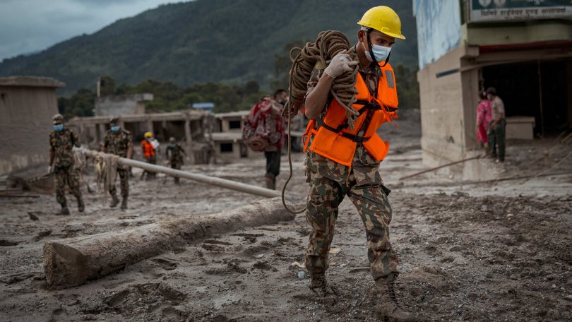 Rescuers are continuing to scour mud-soaked terrain across Nepal and Tibet as authorities race to search for survivors of devastating flash floods that have killed hundreds and left thousands missing. 