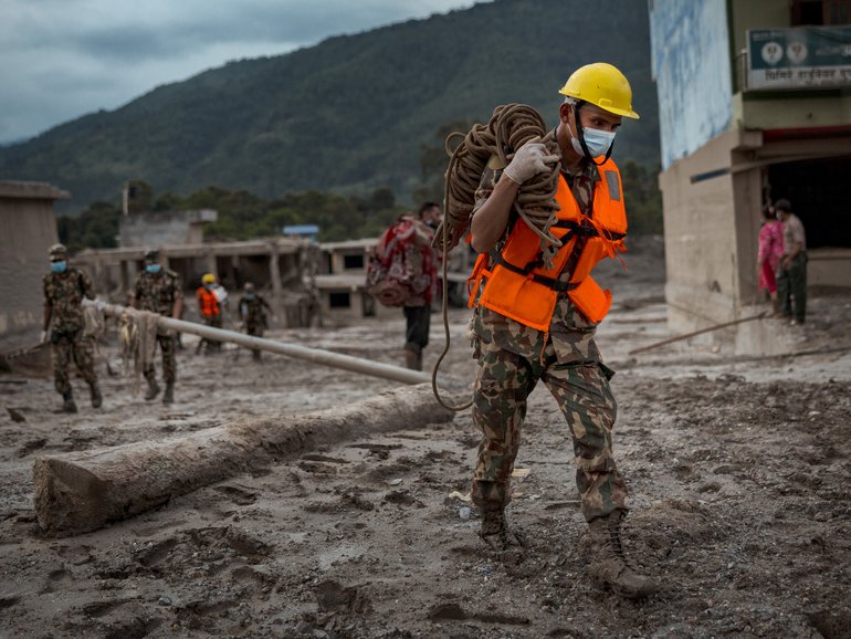 Rescuers are continuing to scour mud-soaked terrain across Nepal and Tibet as authorities race to search for survivors of devastating flash floods that have killed hundreds and left thousands missing. 