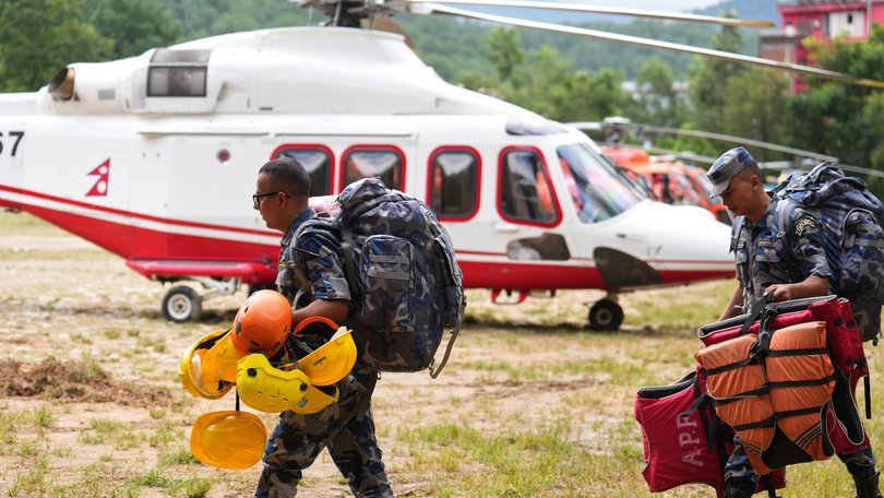 Rescue teams in Nepal are trying to reach more than 900 workers trapped in dozens of tunnels. (AP PHOTO)