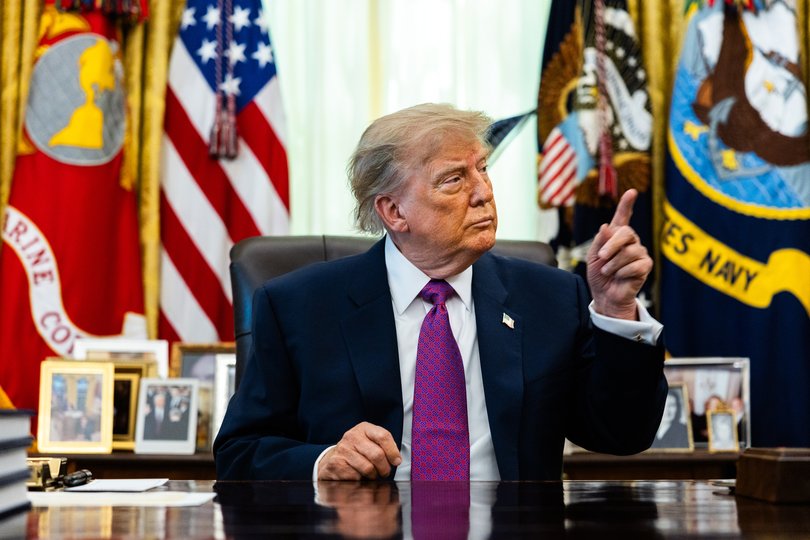 President Donald Trump takes a question from a reporter after signing an executive order to change the name of Lake Ontario to Lake America in the Oval Office on Thursday Aug. 27, 2026. Trump said that the U.S. government had Òfiled all the necessary papers, documents,Ó and that the name change would take effect immediately. (Demetrius Freeman/The New York Times)
