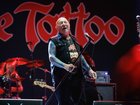 Australian rock legend Angry Anderson is in hospital after suffering a cardiac arrest, with his Rose Tattoo bandmates asking fans to keep him and his family in their thoughts.