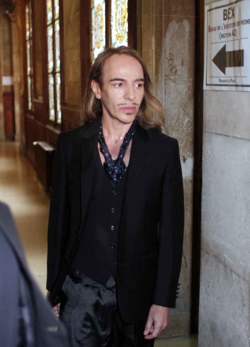 John Galliano arrives at the Paris court house, Wednesday June 22, 2011, over charges he made  anti-Semitic slurs in a Paris cafe.