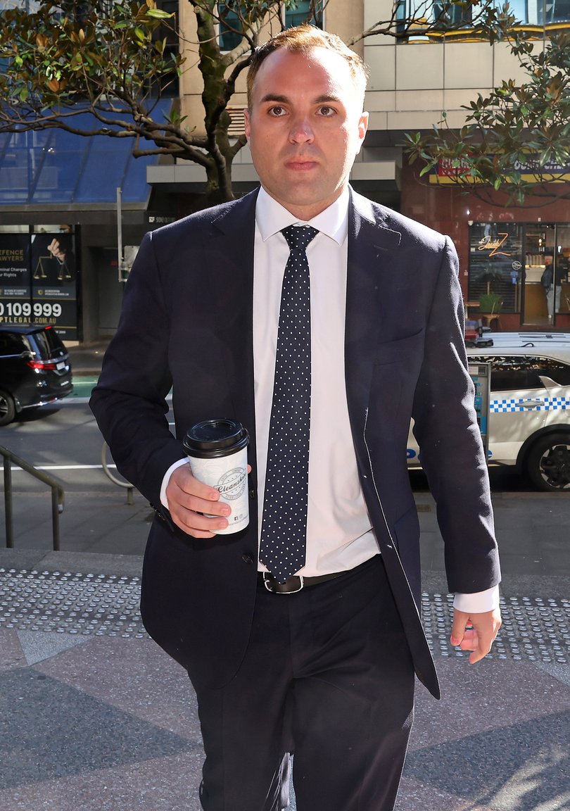 2GB Producer James Willis arrives at Downing centre Court Tuesday.