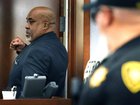 Duane Davis pumps his fist as he is led out of a courtroom after a jury found him guilty in the 1996 killing of rapper Tupac Shakur, in Clark County District Court at the Regional Justice Center in Las Vegas.