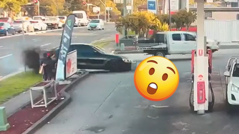 Terrifying video has emerged of a man escaping serious injury after a car violently crashed into an Aussie service station.