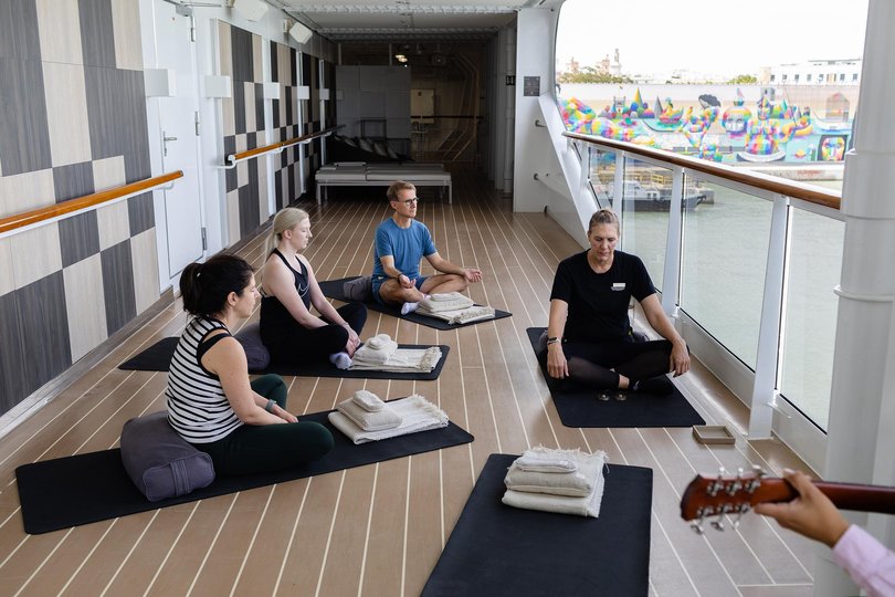 A yin yoga session was accompanied by an acoustic guitar on the Explora.