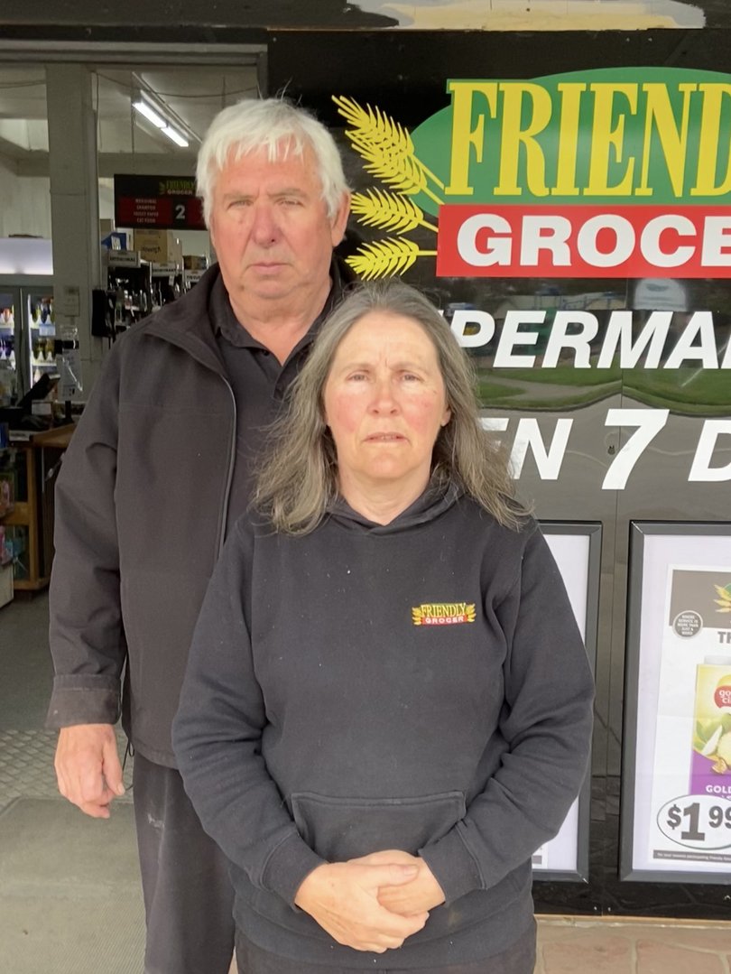Friendly Grocer Longwarry owners John and Janet Porposch  found a handwritten note taped to their shop giving them 24 hours to contact “the Commission” on WhatsApp.