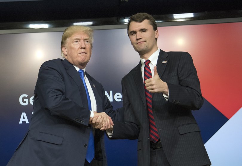 United States President Donald J. Trump, left, shakes hands with with Charlie Kirk, Founder and Executive Director of Turning Point USA, right, after participating in a panel discussion , at the Generation Next Summit at the White House in Washington, DC on Thursday, March 22, 2018. Credit: Ron Sachs / CNP/Sipa USA