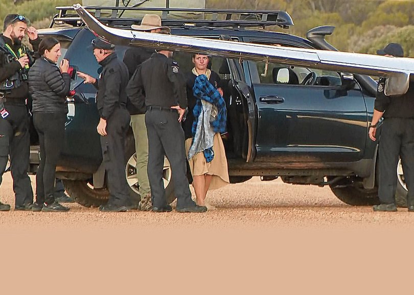The image of the backpacker emerging from a police vehicle after being found following an intense 12 day search would be seen across the world.