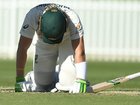Will Pucovski of Australia A lies on the ground after being hit in the helmet by a ball from Kartik Tyagi of India A.