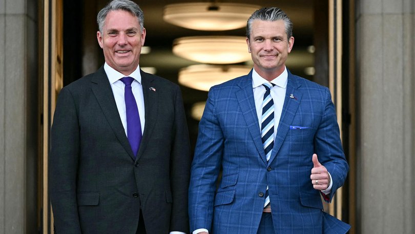 Pete Hegseth gives a thumbs up as he welcomes Australia Deputy Prime Minister Richard Marles during an honour ceremony at the Pentagon.