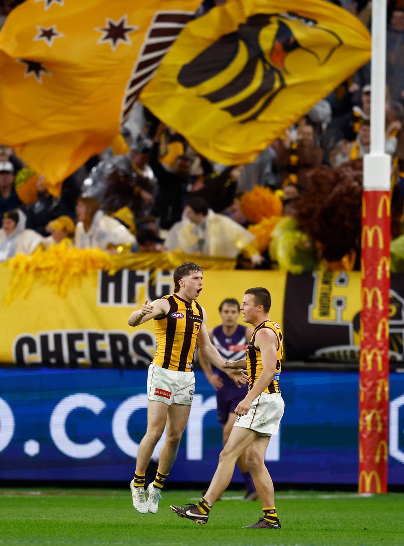 PERTH, AUSTRALIA - SEPTEMBER 03: Dylan Moore (left) and Jack Ginnivan of the Hawks celebrate during the 2026 AFL First Qualifying Final between the Fremantle Dockers and the Hawthorn Hawks at Optus Stadium on September 3, 2026 in Perth, Australia. (Photo by Michael Willson/AFL Photos)