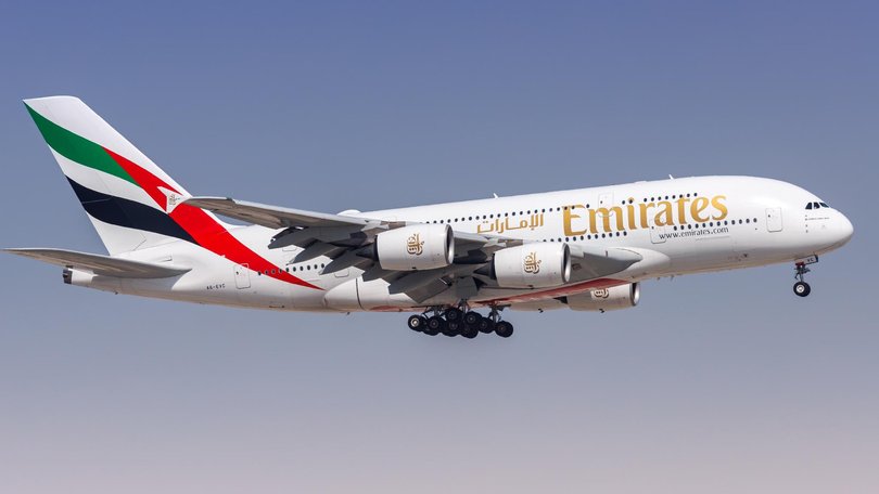 An international flight bound for Sydney has been thrown into chaos after passengers were forced to tied a man to his seat after he allegedly began acting erratically.