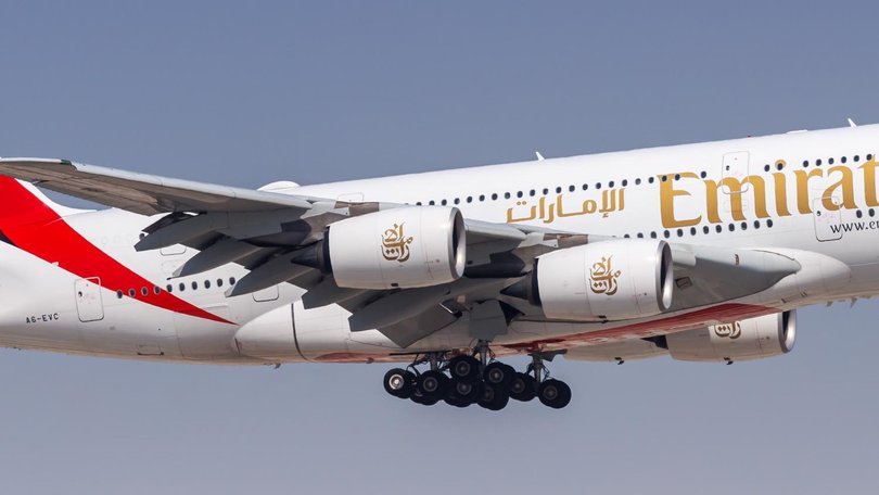 An international flight bound for Sydney has been thrown into chaos after passengers were forced to tied a man to his seat after he allegedly began acting erratically.