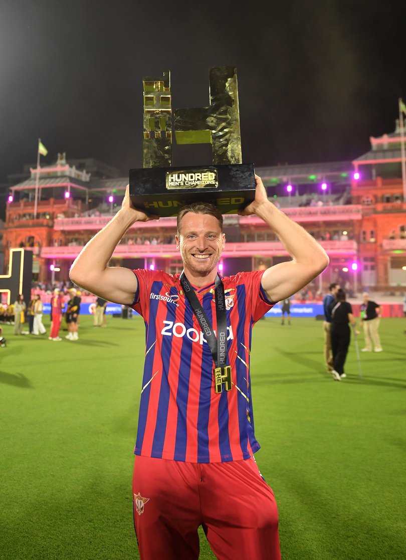 Jos Buttler of Manchester Super Giants lifts The Hundred trophy.
