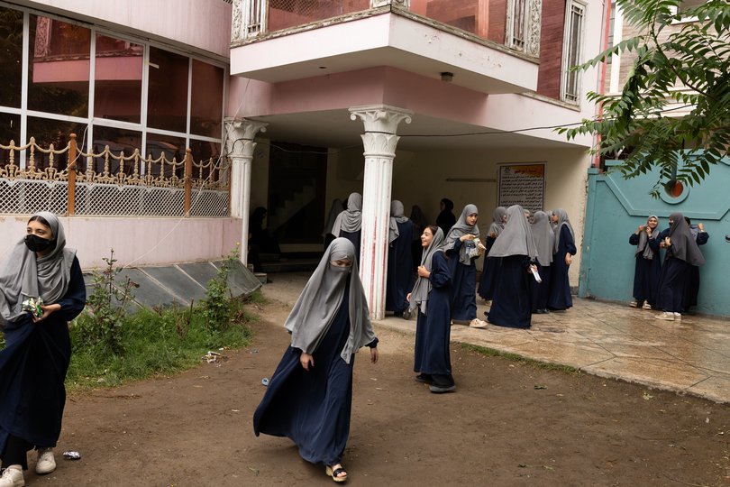 Girls socialise during a short break at a madrassa in Afghanistan.