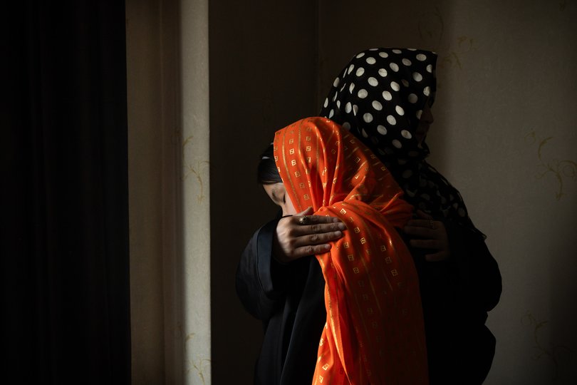 Primary school teacher Tasmin, with her daughter Kowsar. Tasmin convinced a colleague to take her into her class so she could stay in school.