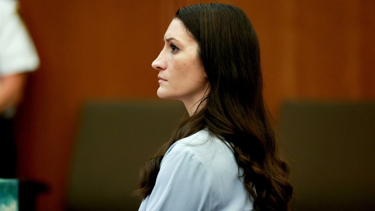 Lindsay Clancy listens to testimony during her murder trial.