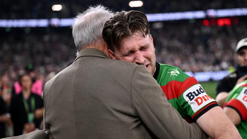 Jai Arrow couldn't contain his emotions when he was embraced by Rabbitohs coach Wayne Bennett. (Dan Himbrechts/AAP PHOTOS)