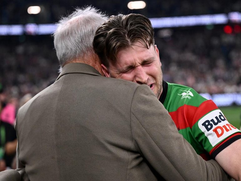 Jai Arrow couldn't contain his emotions when he was embraced by Rabbitohs coach Wayne Bennett. (Dan Himbrechts/AAP PHOTOS)