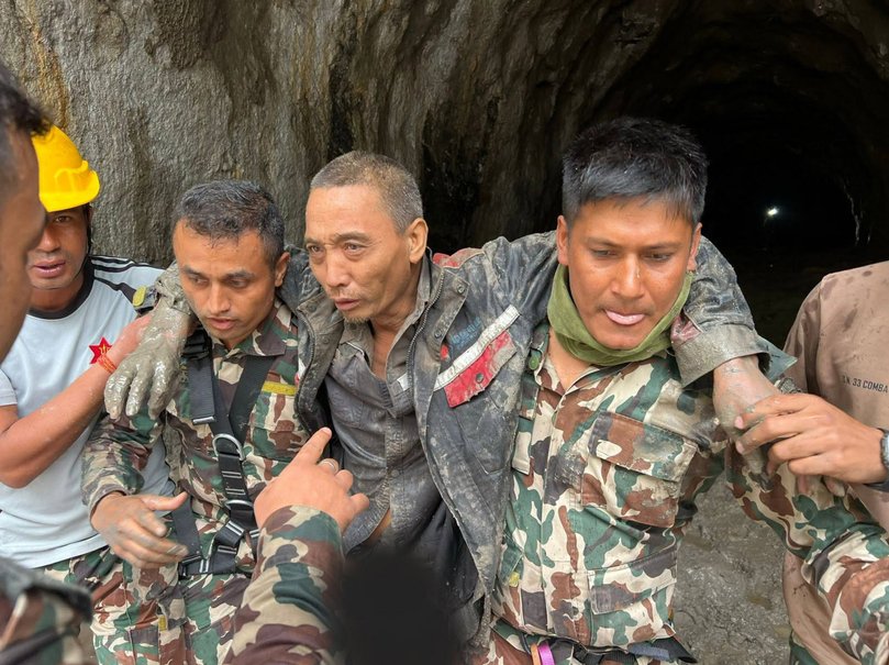 In this photo provided by the Nepal Army, a Chinese national is seen after being rescued by soldiers during an ongoing operation at the Trishuli-3A hydropower project in Nepal's Rasuwa district, Saturday, Sept. 5, 2026.
