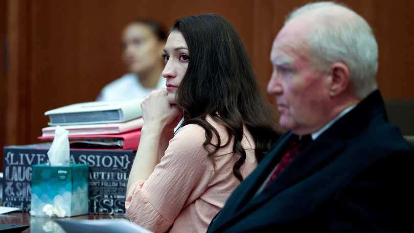 Lindsay Clancy and defense attorney Kevin Reddington listen to testimony at Plymouth Superior Court.