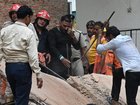 Five people have been killed following the collapse of a building in the Indian capital New Delhi, with rescuers trying to reach people trapped in the rubble.