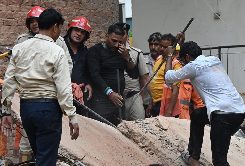 NDRF, local residents and administration officials joined rescue teams after a multi-storey boys' PG hostel collapsed in South-West Delhi on Sunday afternoon, killing five and leaving around 4050 students feared trapped under the rubble, on September 6, 2026 in New Delhi, India. 