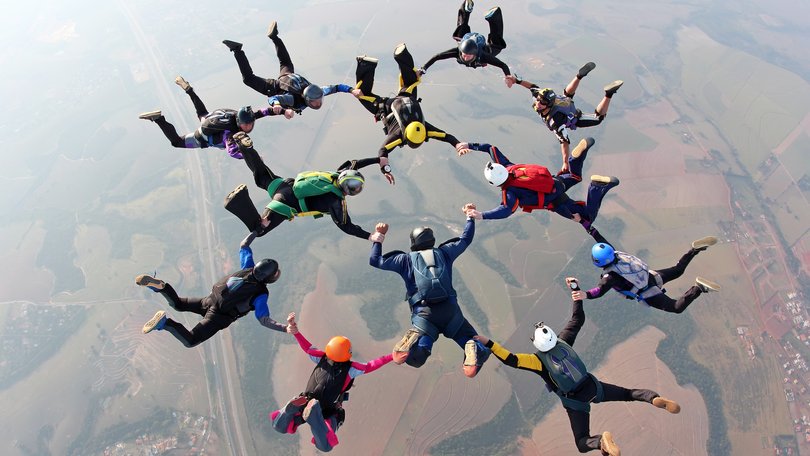 An experienced skydiver has plunged thousands of feet after being knocked unconscious in a terrifying freefall accident.
