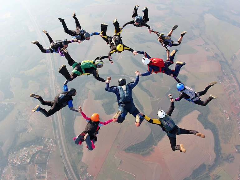An experienced skydiver has plunged thousands of feet after being knocked unconscious in a terrifying freefall accident.