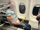 The 67-year-old passenger allegedly became belligerent when he started yelling about Jesus and going to hell at a man who was seated next to him in first class. 
