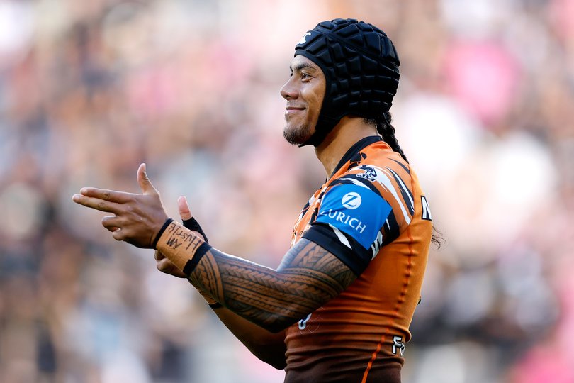 Jarome Luai of the Tigers gestures.