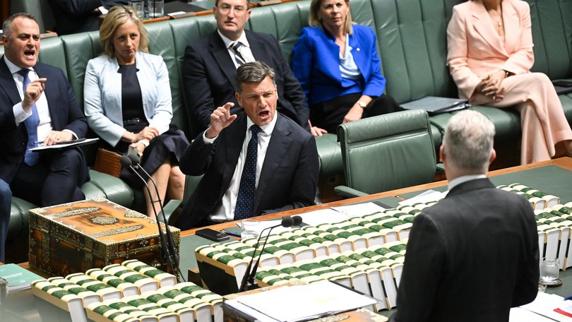 Australian Opposition leader Angus Taylor reacts as he listens to Australian Home Affairs Minister Tony Burke during Question Time on Monday.
