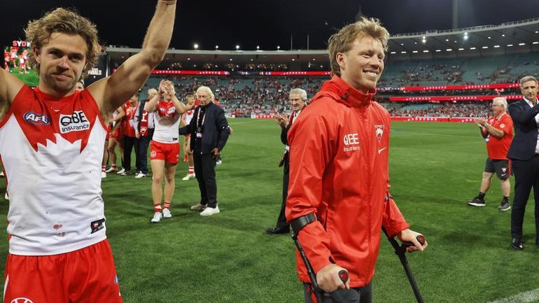 Injured Sydney captain Callum Mills put on a brave face after the Swans' win over the Lions. (Mark Evans/AAP PHOTOS)