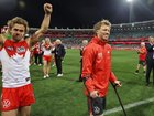 Injured Sydney captain Callum Mills put on a brave face after the Swans' win over the Lions. (Mark Evans/AAP PHOTOS)