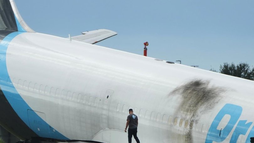 The Amazon cargo plane travelled about 400 metres past the paved runway surface. (AP PHOTO)