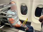 The 67-year-old passenger allegedly became belligerent when he started yelling about Jesus and going to hell at a man who was seated next to him in first class. 