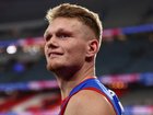 Adam Treloar has reluctantly called time on his AFL career.