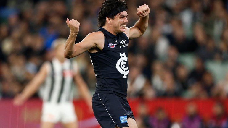 Elijah Hollands of the Blues celebrates.