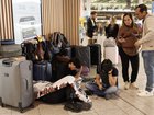 Passengers wait for flights and connections at the South terminal of Gatwick Airport on September 09, 2026 in Crawley, England. 