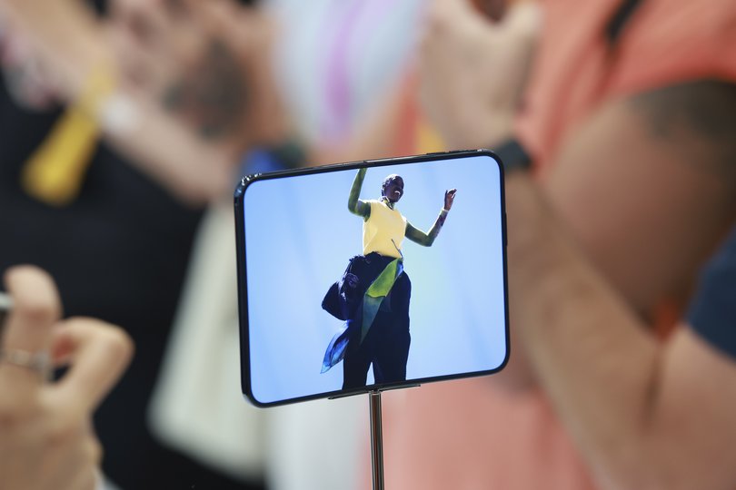 Apple’s Duo foldable phone on display at an event at Apple’s campus.