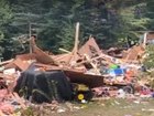 A mother and son have been killed and three others seriously injured after a house exploded during a birthday party in Vermont.