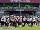 San Francisco 49ers players work out during a practice.