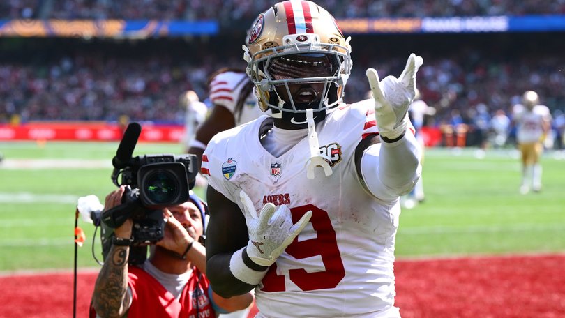 Deebo Samuel Sr. #19 of the San Francisco 49ers celebrates scoring a touchdown.